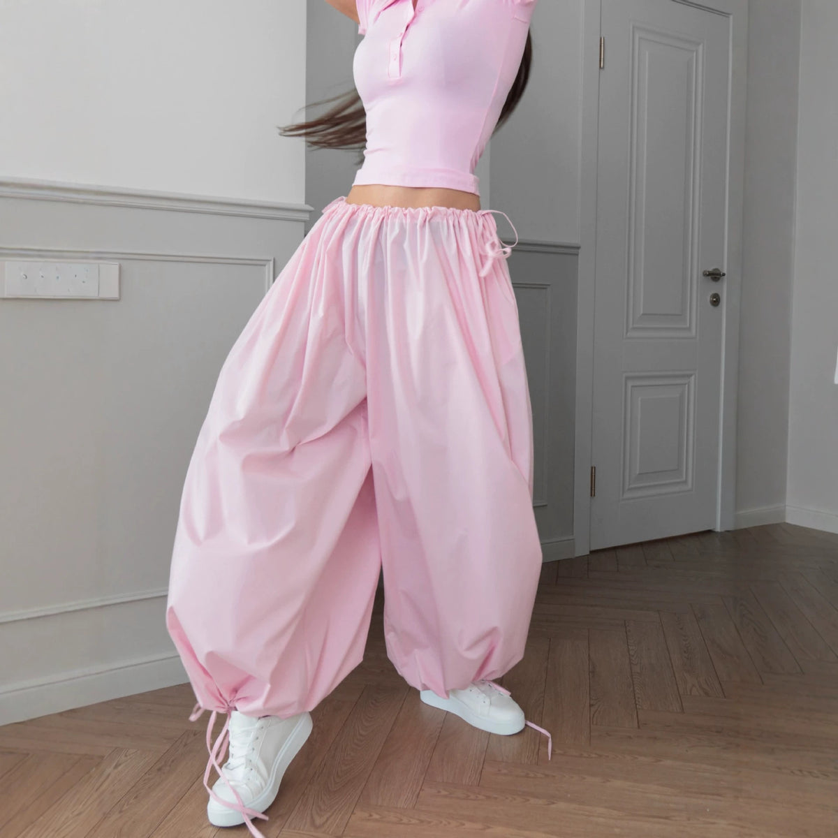 Flow Pants shown in movement, deep drape